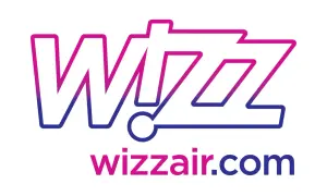 Logo Wizz Air z napisem wizzair.com. Szukasz okazji? Sprawdź wizzair kod rabatowy na tanie loty!
