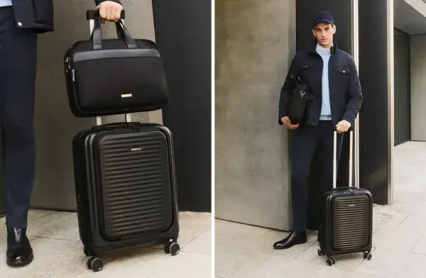 Elegancka, czarna walizka kabinowa i torba podróżna – idealny zestaw, jaka walizka do samolotu dla stylowego podróżnika.